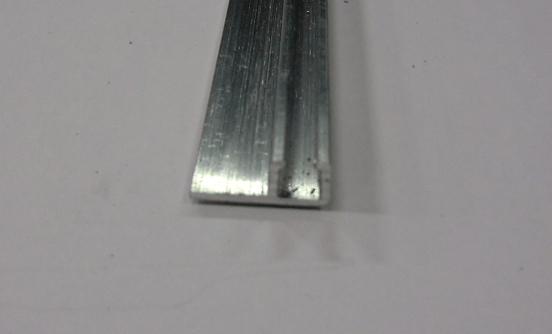[304002002] F-5 profile for brush strip. length = 2500mm